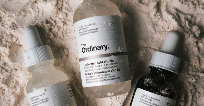 Retinol - Dropper Bottles of Skincare Products from The Ordinary Lying on Talcum Powder